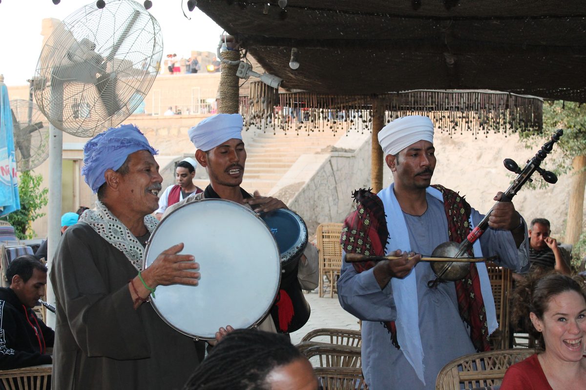 Don't Take Our Word For It - 10 - EZ TOUR EGYPT Nubian musicians playing a frame drum and rababa for EZ Tour Egypt guests at a riverside gathering in Aswan